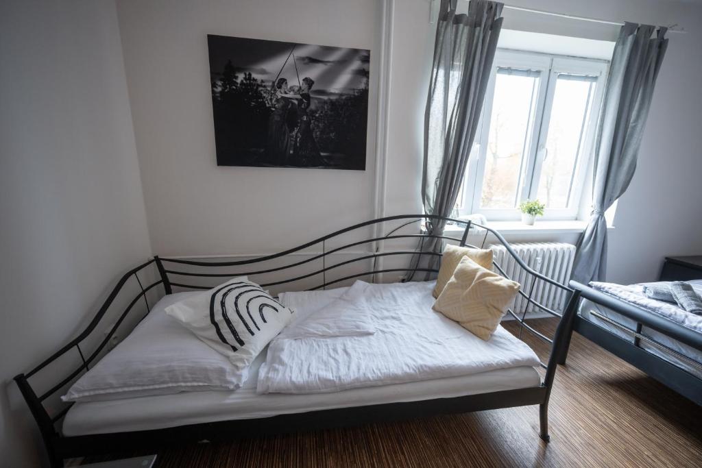 Postel nebo postele na pokoji v ubytování Apartmány Lanna