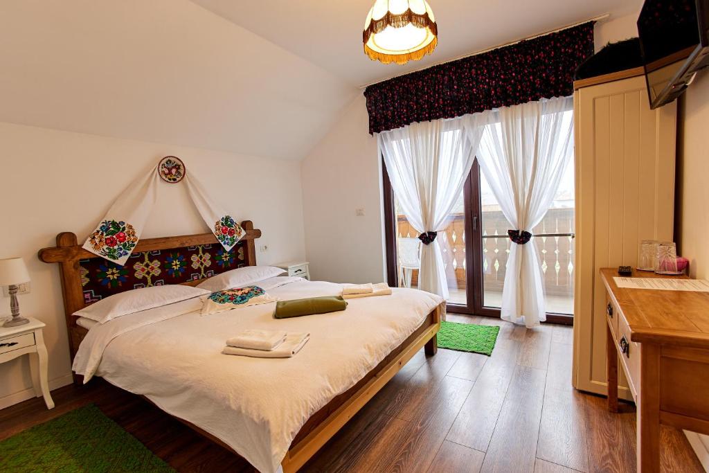 Postel nebo postele na pokoji v ubytování Gradina Lu' Ion "A Home Away From Home"