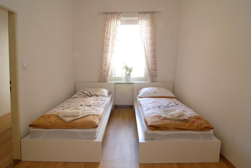 Postel nebo postele na pokoji v ubytování Fontana Pizzeria - Pension