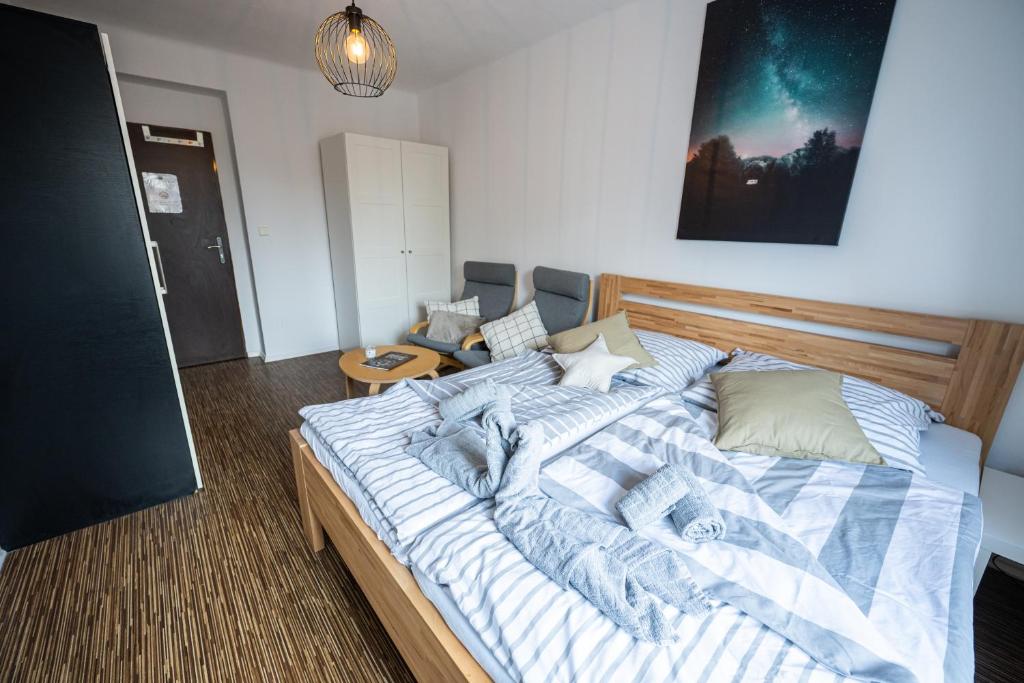 Postel nebo postele na pokoji v ubytování Apartmány Lanna