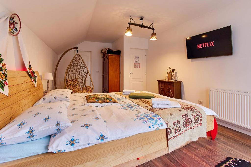 Postel nebo postele na pokoji v ubytování Gradina Lu' Ion "A Home Away From Home"