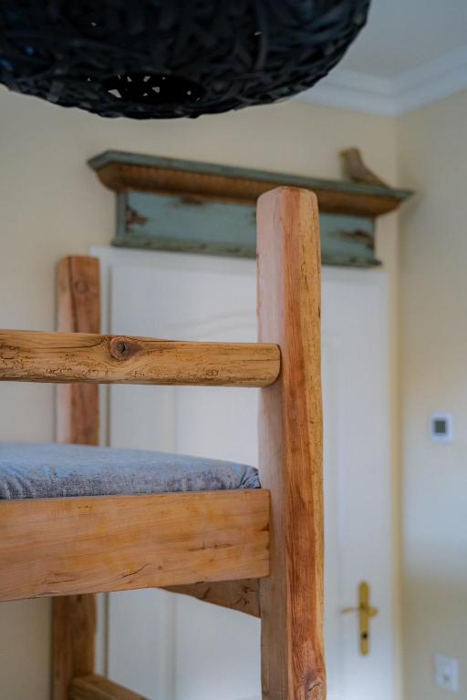 Palanda nebo palandy na pokoji v ubytování CASA BELGERI - Bed & Breakfast