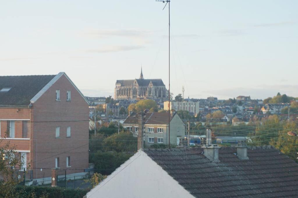 Výhľad na mesto Saint-Quentin alebo výhľad na mesto priamo z apartmánu