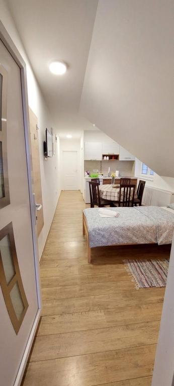 Postel nebo postele na pokoji v ubytování ANA Apartment