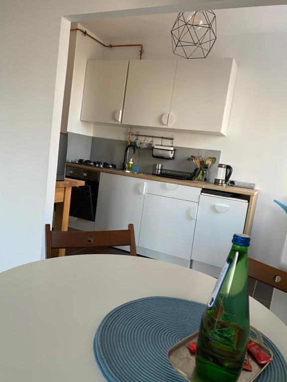 Kuchyňa alebo kuchynka v ubytovaní Słoneczny apartament