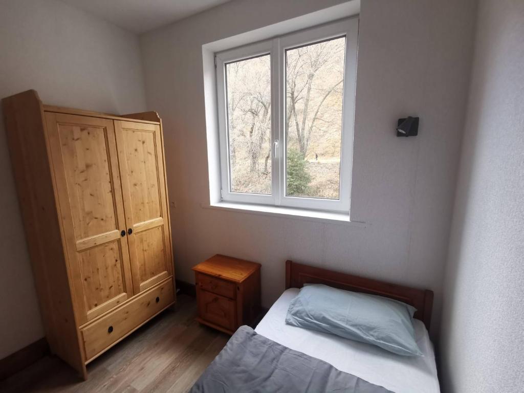 Postel nebo postele na pokoji v ubytování Appartements au bord de la rivière