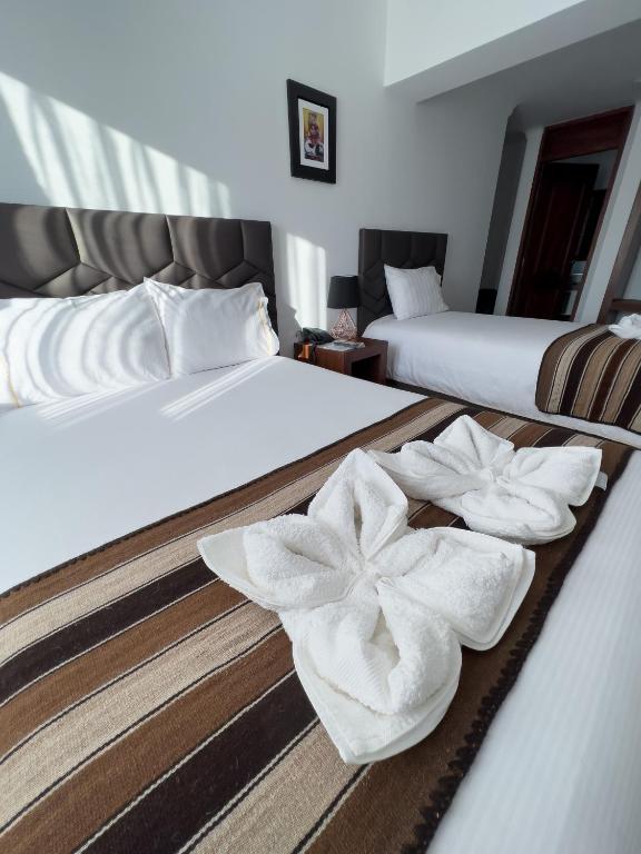 Postel nebo postele na pokoji v ubytování Hotel Andes de Urubamba