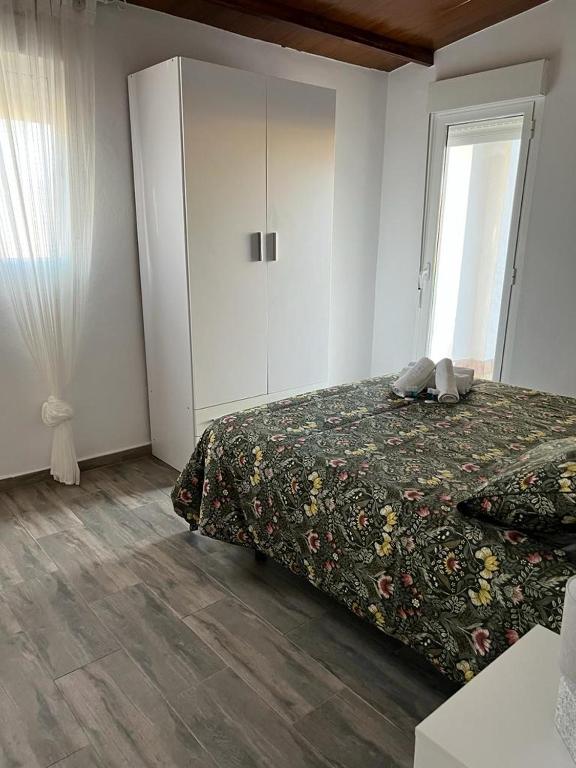 Postel nebo postele na pokoji v ubytování las camelias