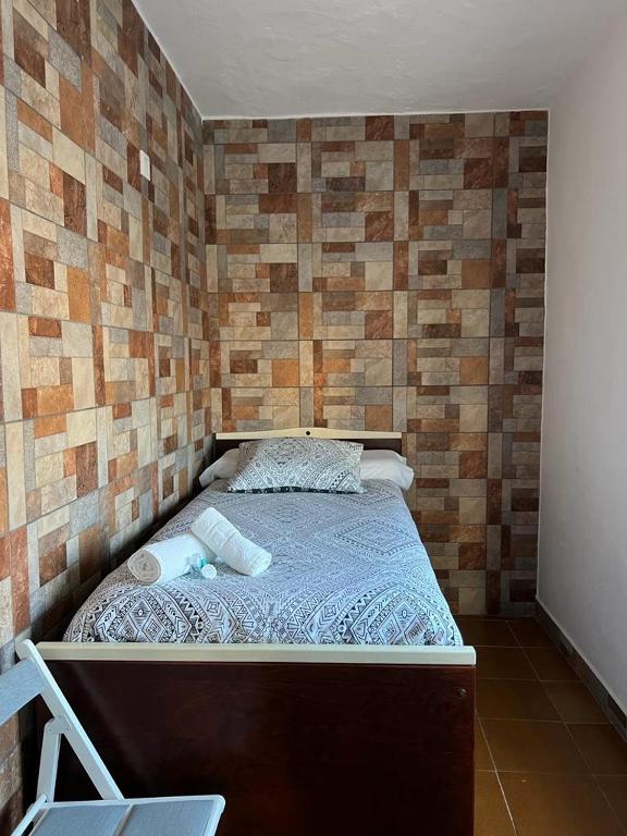 Postel nebo postele na pokoji v ubytování las camelias