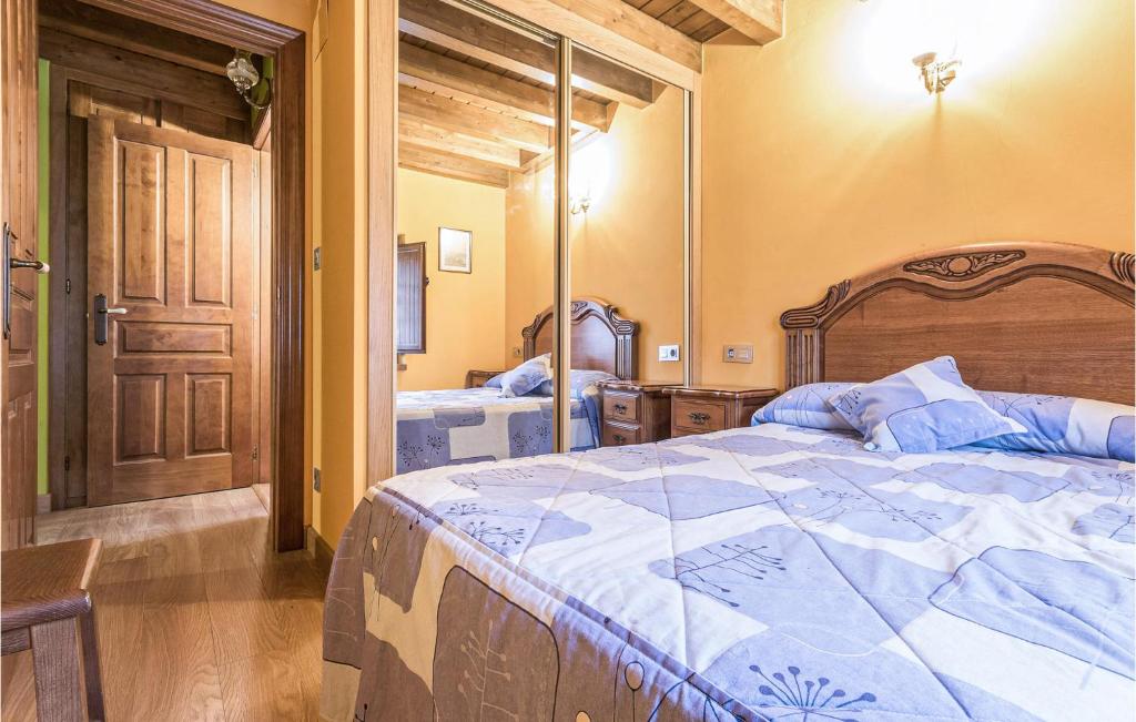 Postel nebo postele na pokoji v ubytování Casa La Pila, Asturias