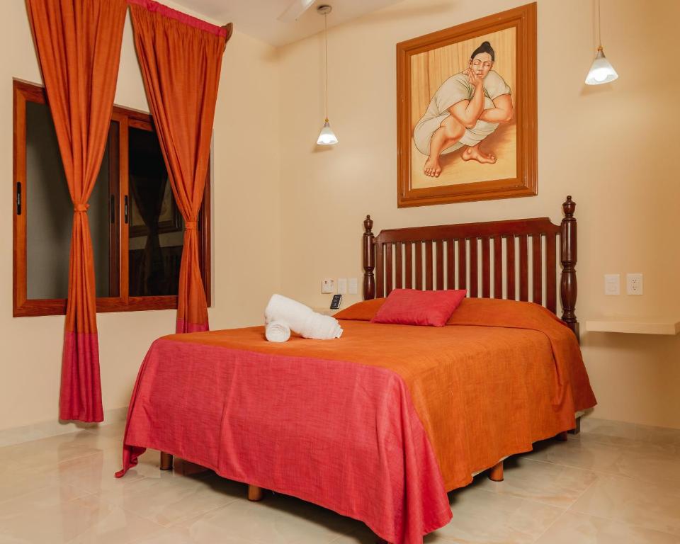 Postel nebo postele na pokoji v ubytování Hotel Nojoch che