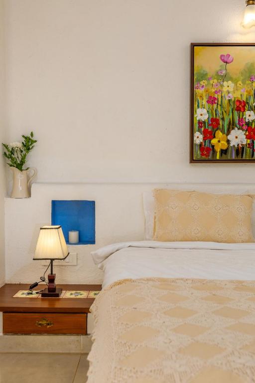 Postel nebo postele na pokoji v ubytování Casa de Amor