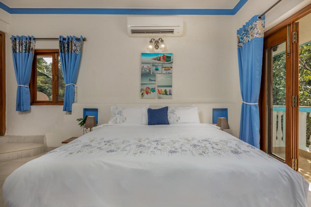 Postel nebo postele na pokoji v ubytování Casa de Amor