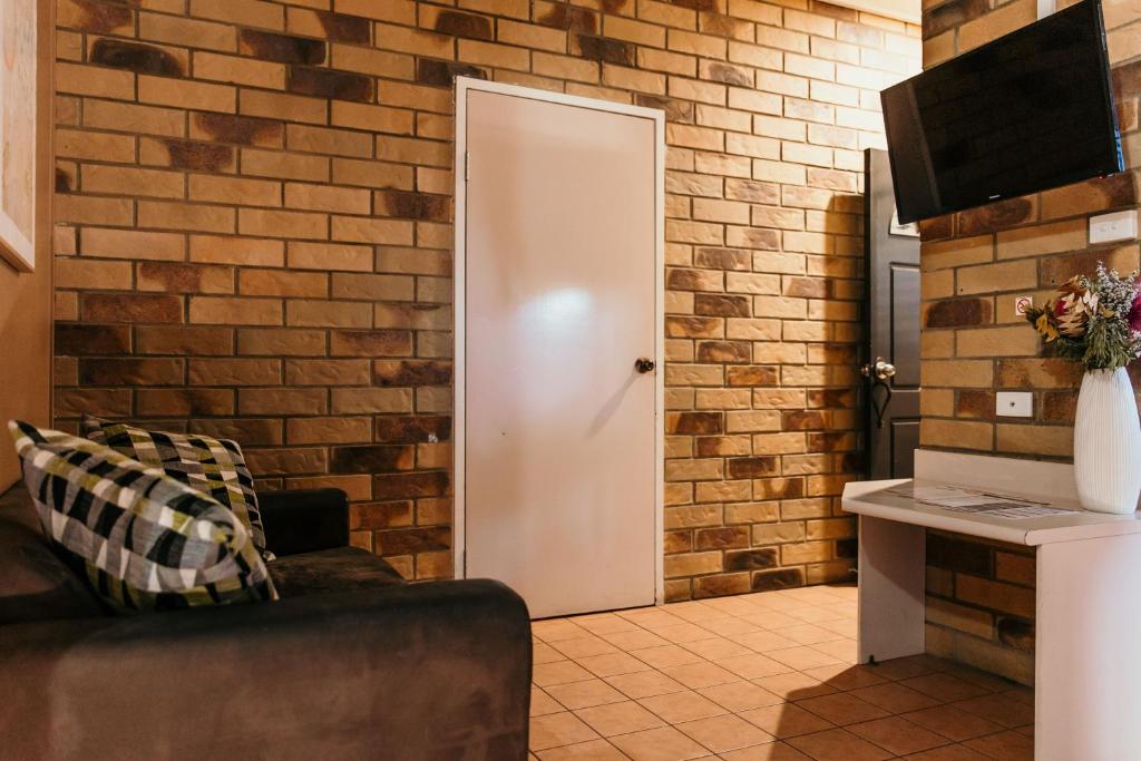 Kuchyň nebo kuchyňský kout v ubytování Abacus Motel