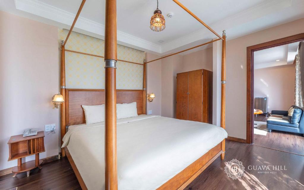 Postel nebo postele na pokoji v ubytování Guava Hill Boutique Hotel