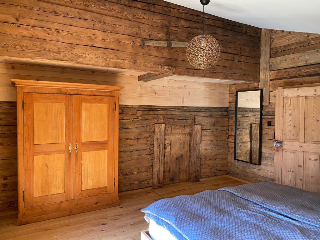 Postel nebo postele na pokoji v ubytování Chalet Brünig