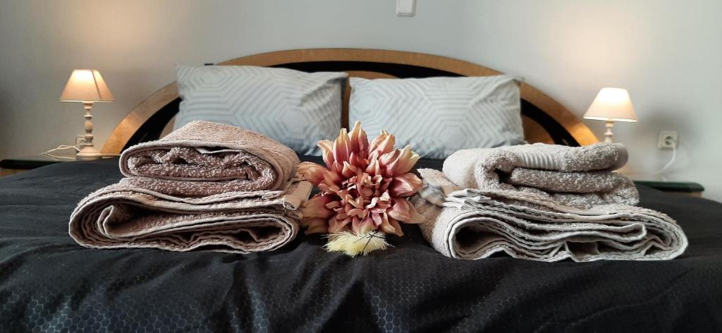 A bed or beds in a room at Koukaki View