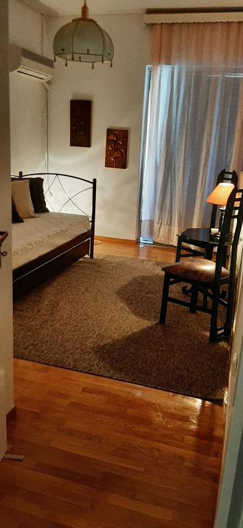 A bed or beds in a room at Koukaki View