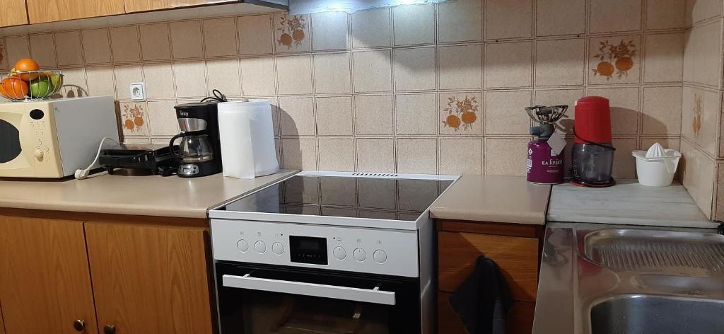A kitchen or kitchenette at Koukaki View