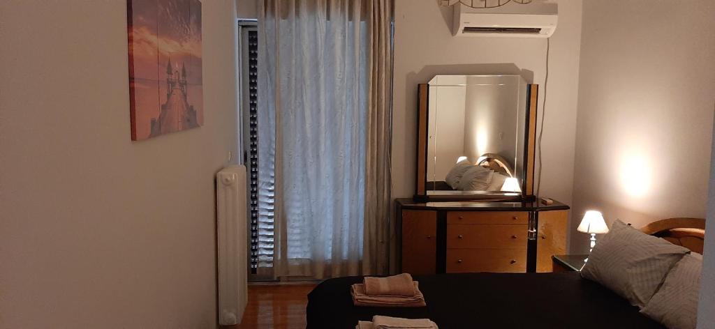 A bed or beds in a room at Koukaki View