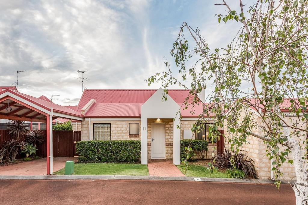 a house with a red roof at Bluewater Bungalow in Dunsborough