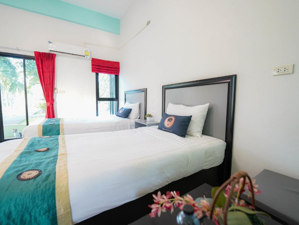 RoomQuest Chonburi Phanat Nikhom - Standard Twin Room