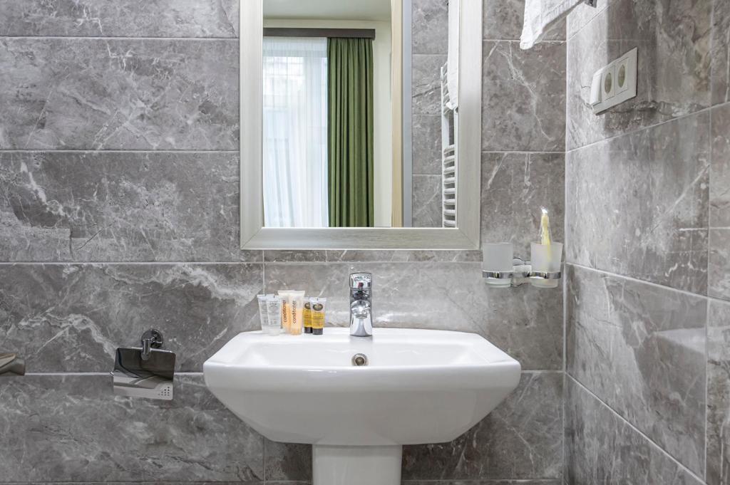 Koupelna v ubytování Apart Hotel GH