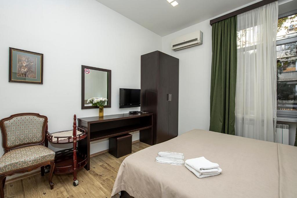 TV a/nebo společenská místnost v ubytování Apart Hotel GH