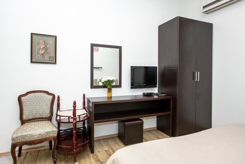 TV a/nebo společenská místnost v ubytování Apart Hotel GH