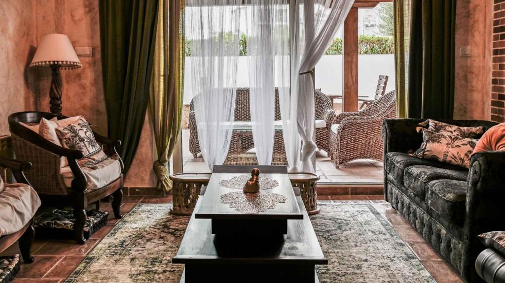 a living room with a couch and a table at Ground Floor Apartment with Three Bed on La Torre Golf - AO1402 in Torre-Pacheco