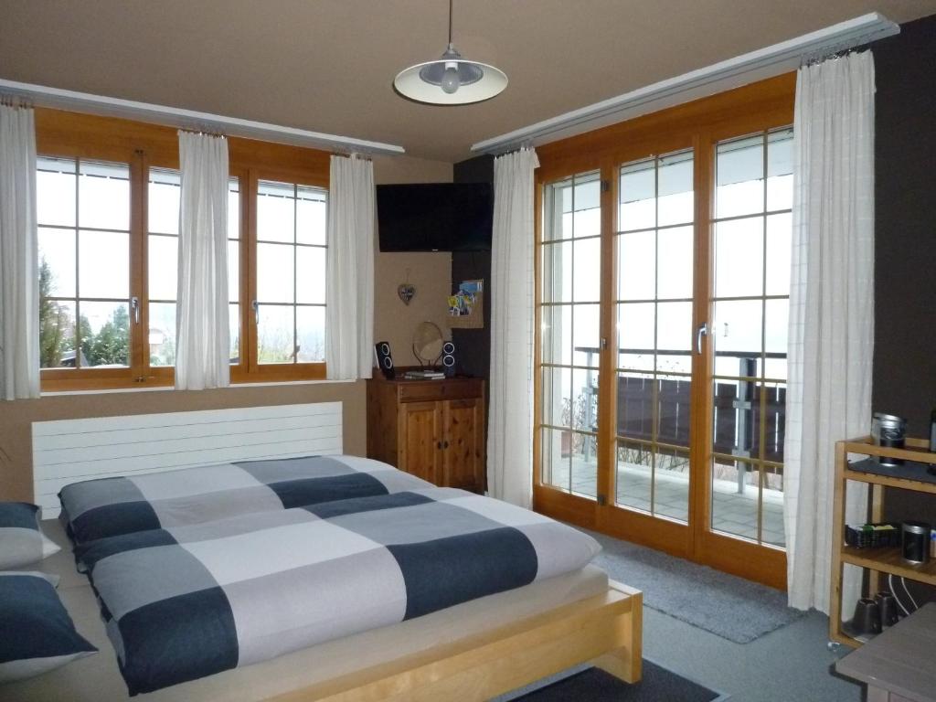 Postel nebo postele na pokoji v ubytování B&B Haussener