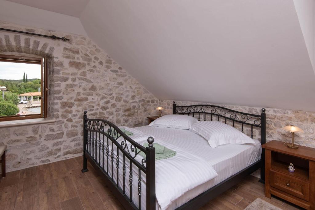 Posteľ alebo postele v izbe v ubytovaní Holiday Villa Mirce - Lovište