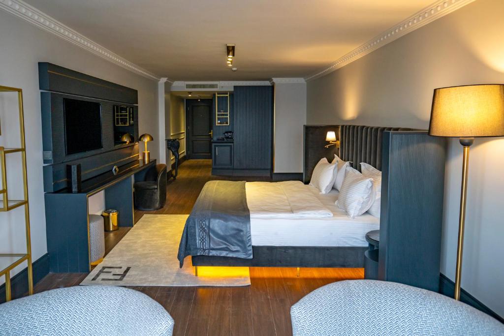 Postel nebo postele na pokoji v ubytování A11 HOTEL BOSPHORUS
