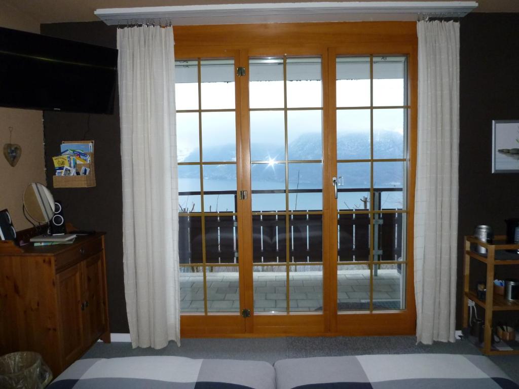 Postel nebo postele na pokoji v ubytování B&B Haussener