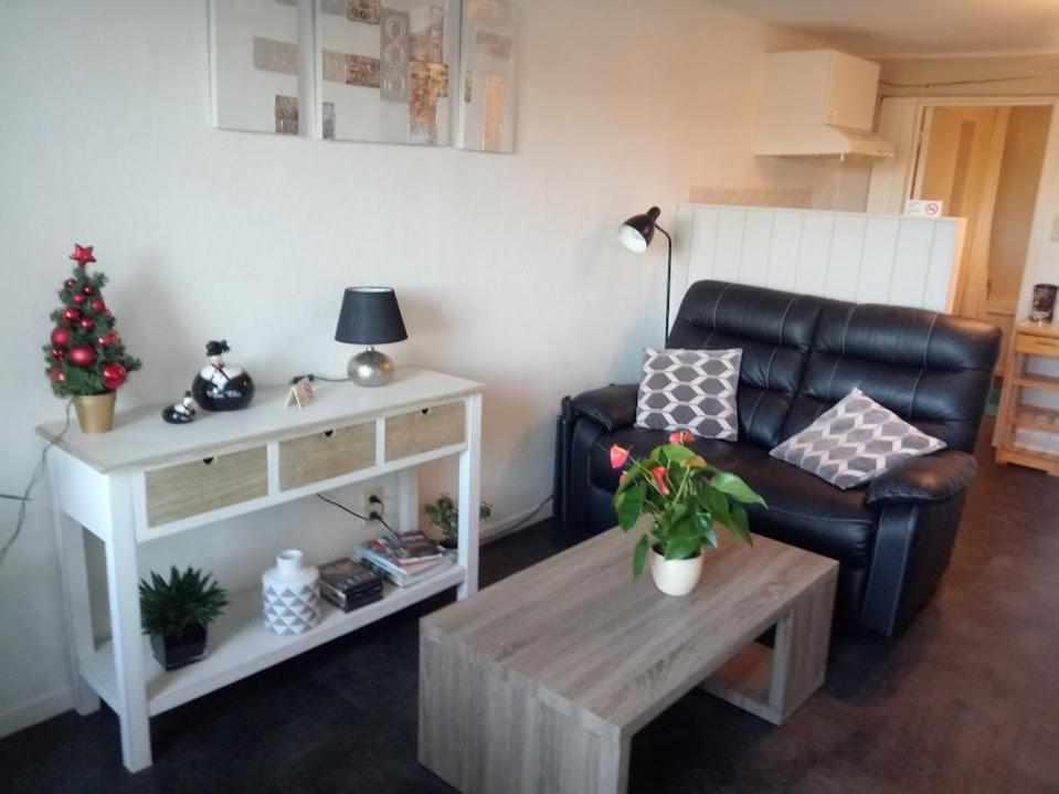 Posezení v ubytování Maison Raquet