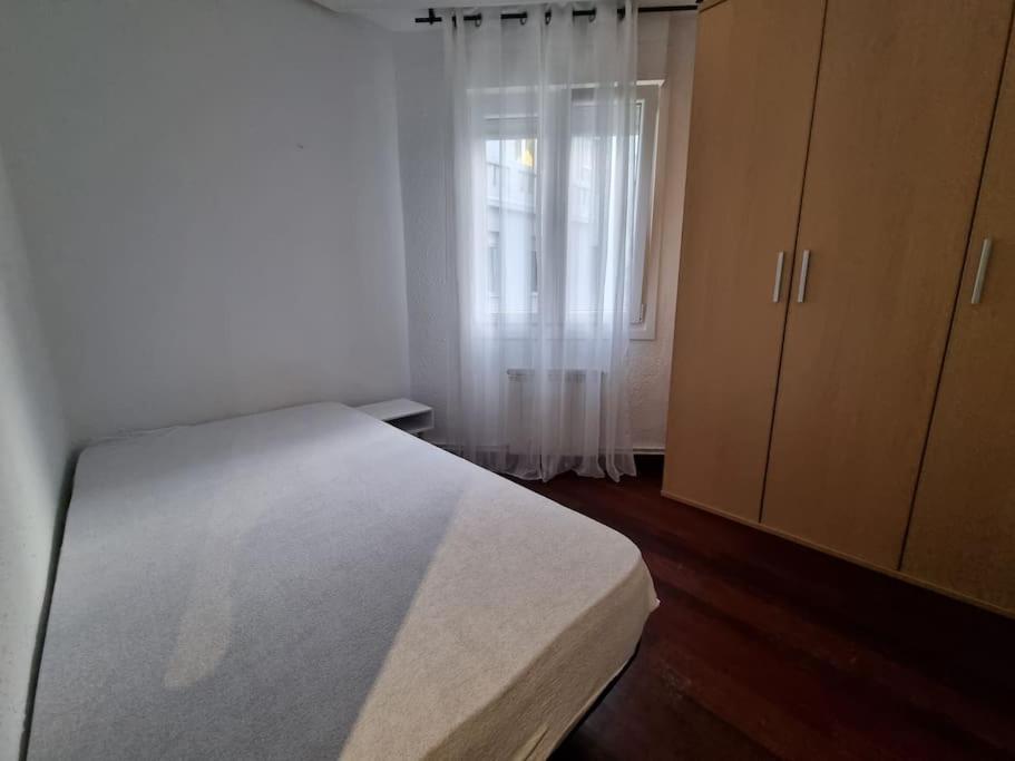 Postel nebo postele na pokoji v ubytování C01A04 Céntrico 4 dormitorios