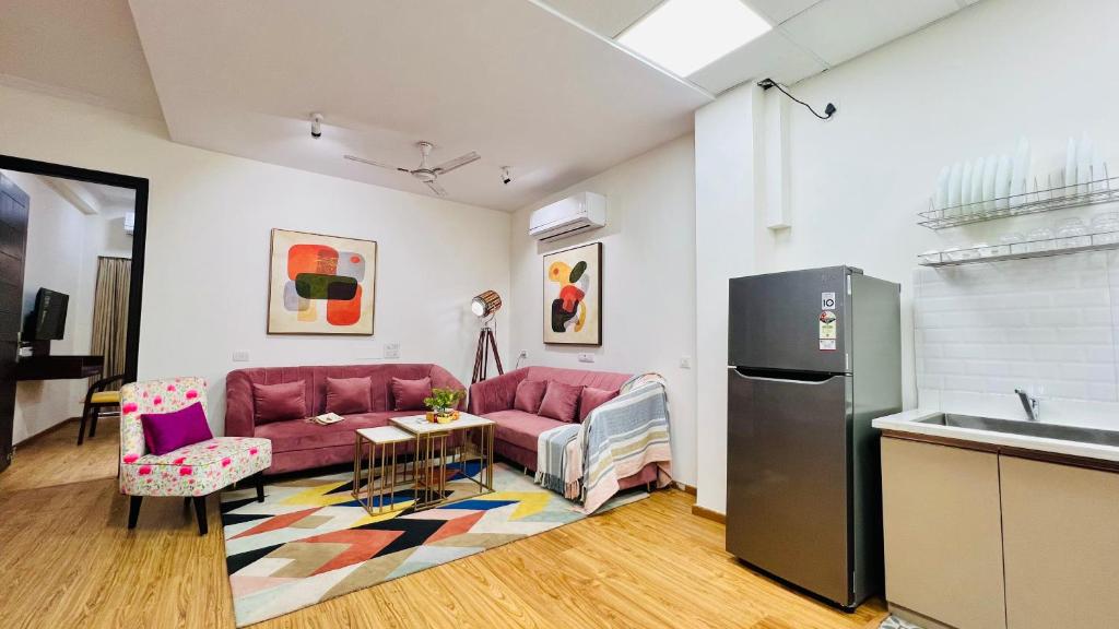 Kuchyň nebo kuchyňský kout v ubytování Olive Service Apartments - City Centre Noida