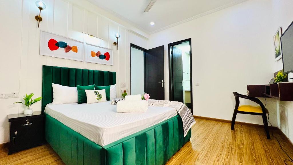 Postel nebo postele na pokoji v ubytování Olive Service Apartments - City Centre Noida