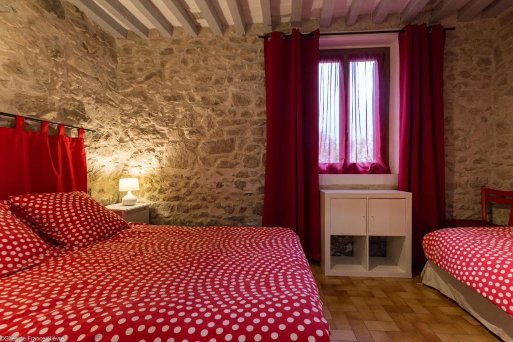 Postel nebo postele na pokoji v ubytování Gîte Sylvie