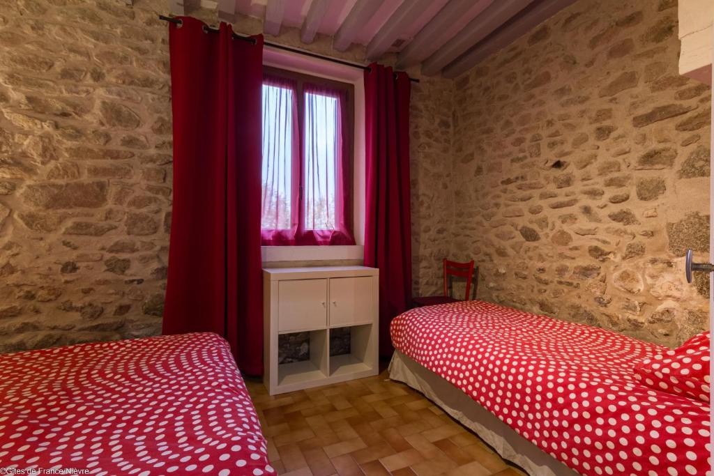 Postel nebo postele na pokoji v ubytování Gîte Sylvie