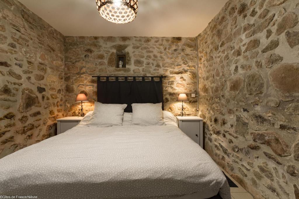 Postel nebo postele na pokoji v ubytování Gîte Sylvie