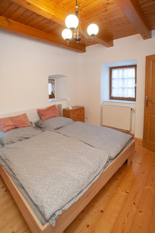 Postel nebo postele na pokoji v ubytování Apartmány NaVyhlídce