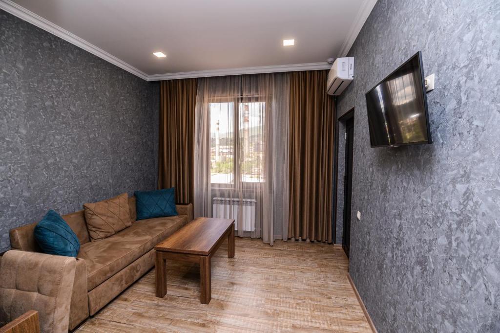 TV a/nebo společenská místnost v ubytování Palermo Hotel