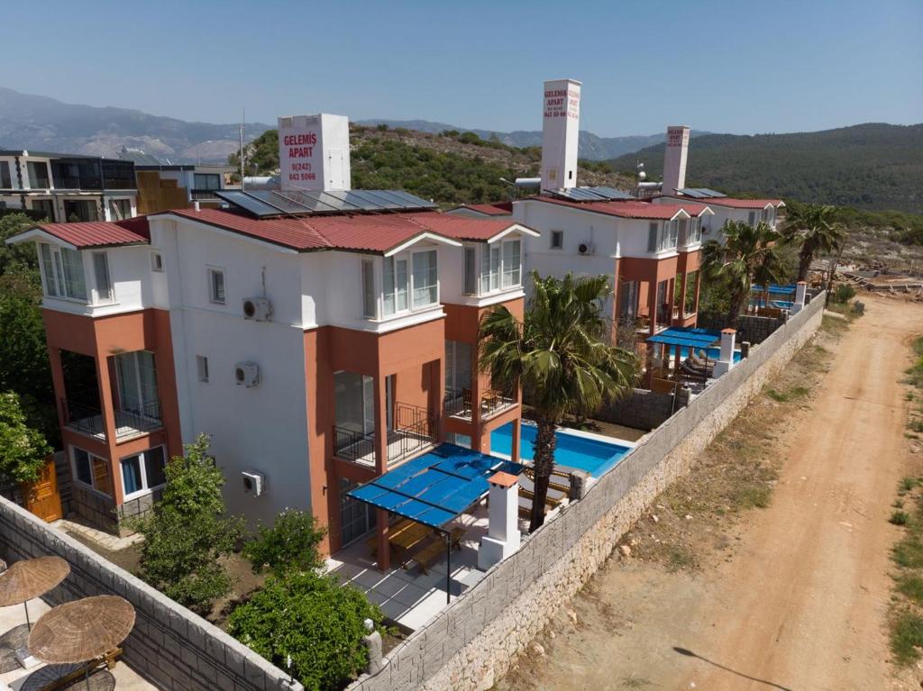 an aerial view of a house with a swimming pool at Patara Evleri in Patara