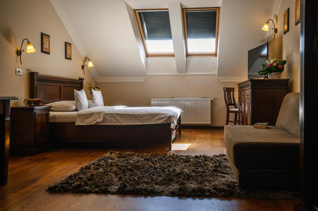 Postel nebo postele na pokoji v ubytování Aparthotel Iosefin Residence