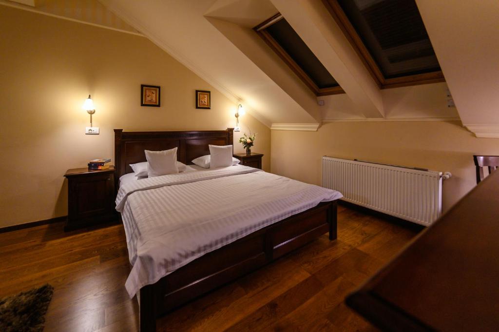 Postel nebo postele na pokoji v ubytování Aparthotel Iosefin Residence