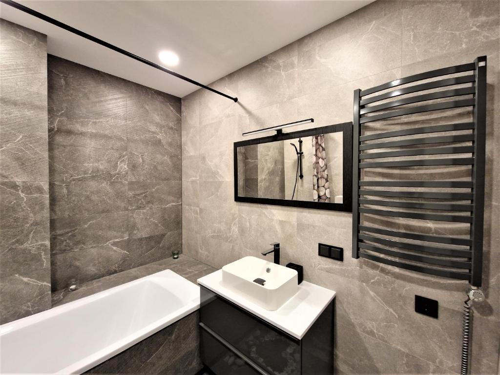 Ett badrum på Aurea apartment
