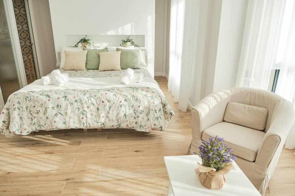 Łóżko lub łóżka w pokoju w obiekcie CASA ROLAO Elegante Casa Familiar 10 personas