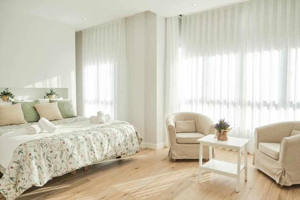 Łóżko lub łóżka w pokoju w obiekcie CASA ROLAO Elegante Casa Familiar 10 personas