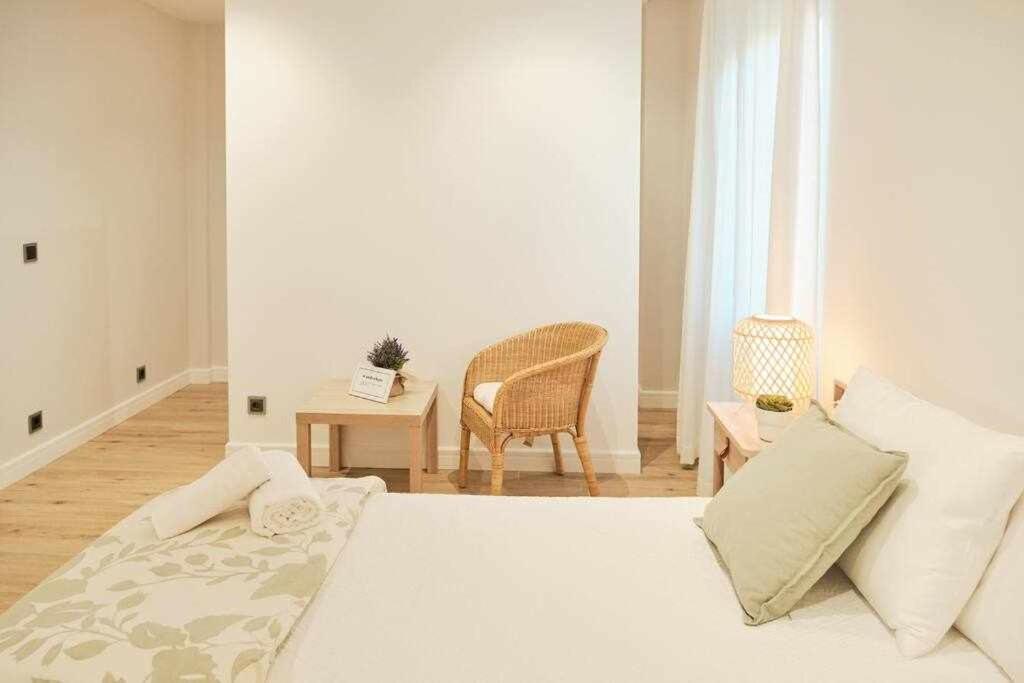 Łóżko lub łóżka w pokoju w obiekcie CASA ROLAO Elegante Casa Familiar 10 personas